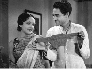 Devika Rani and Ashok Kumar in an iconic scene from Bombay Talkies film, Nirmala, 1938 (Josef Wirsching)_Bollywoodirect